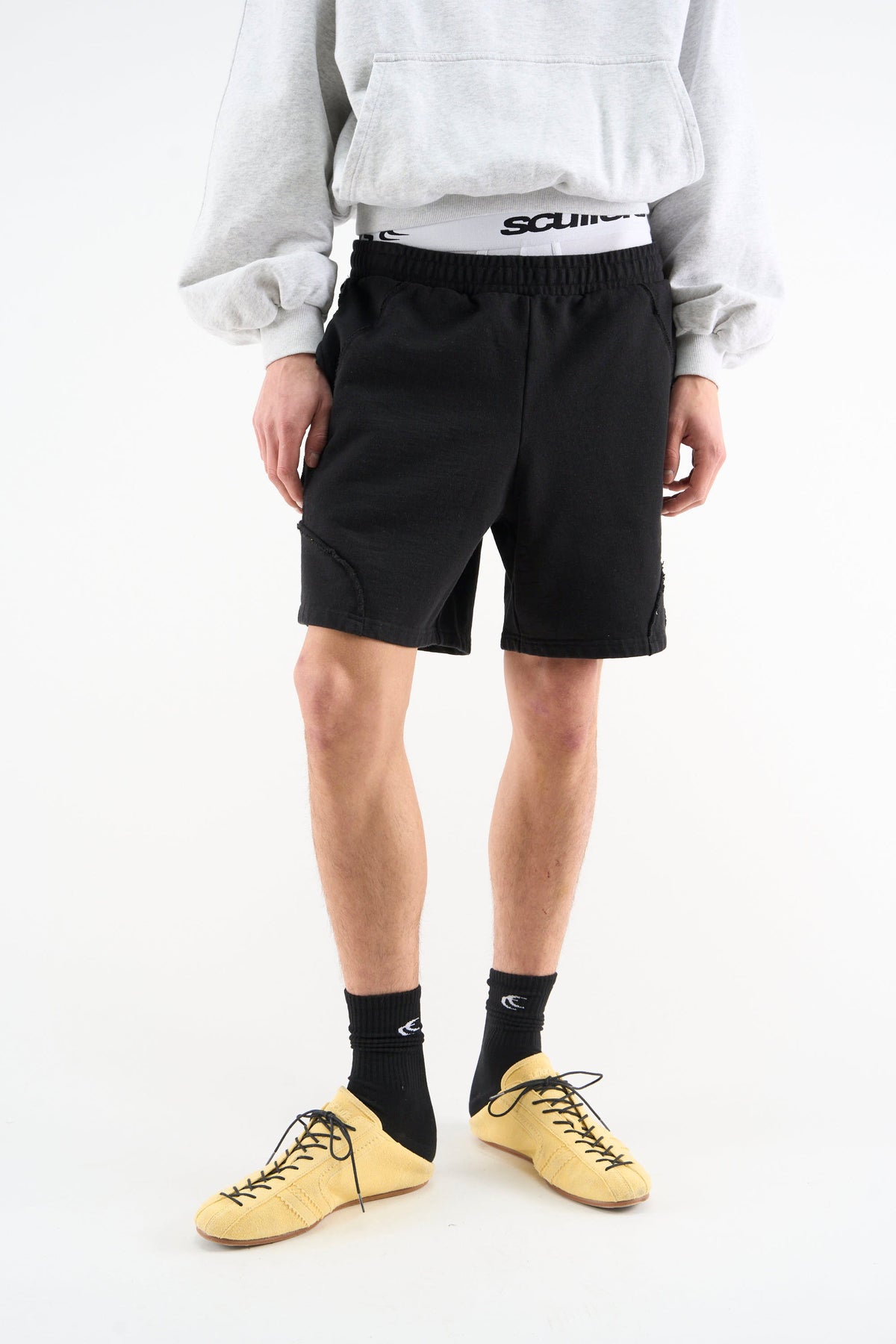 Shorts negros deportivos de alta costura