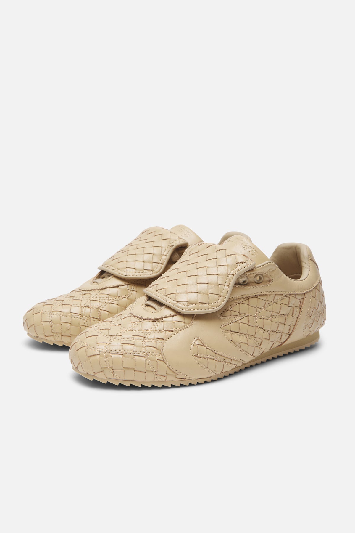 Zapatilla icónica trenzada de color beis